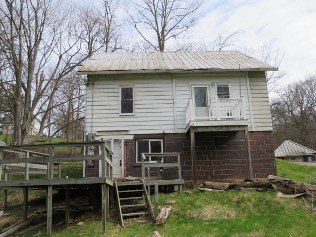 2189 Dunn Station Road Prosperity, PA 15329 - Photo 30 of 36 a view of a house with a yard and a large tree