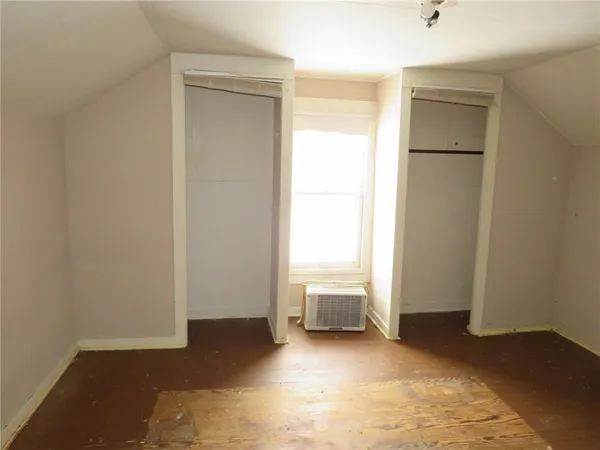 an empty room with a door