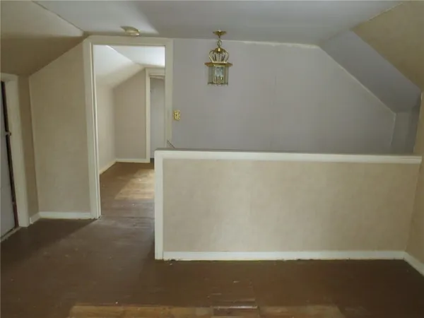 a view of a hallway with shower