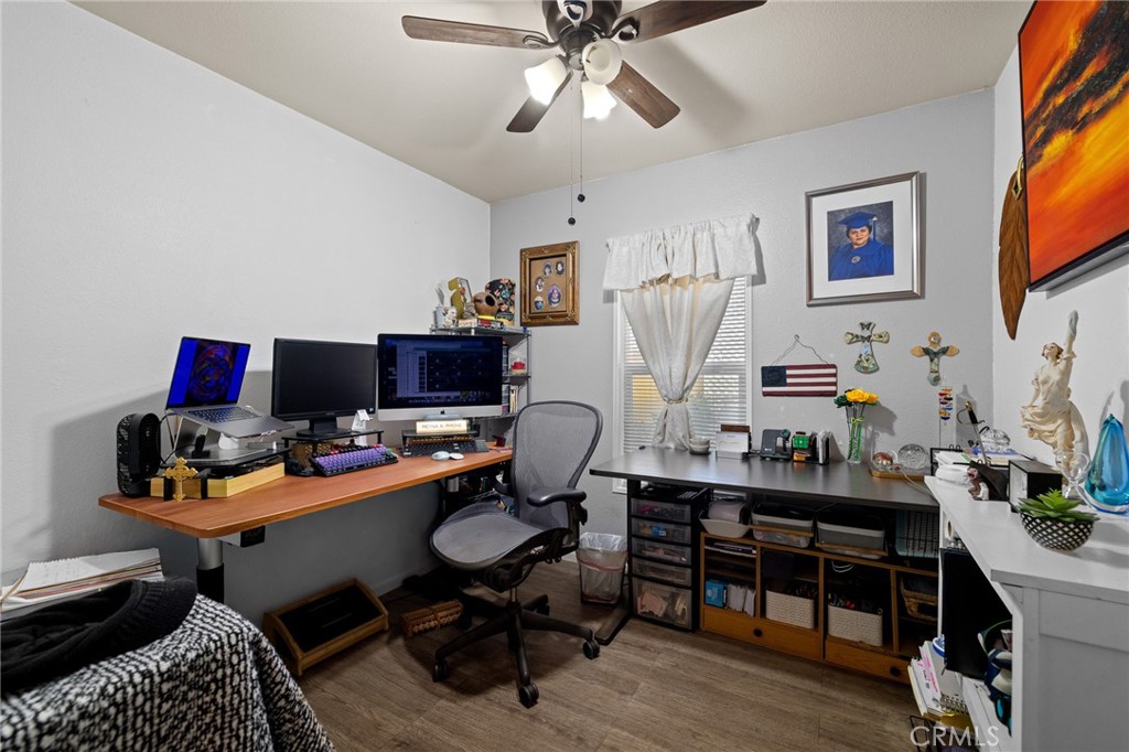 3524 East Avenue R, Unit 121 Palmdale, CA 93550 - Photo 17 of 40 a view of a workspace with furniture and a window