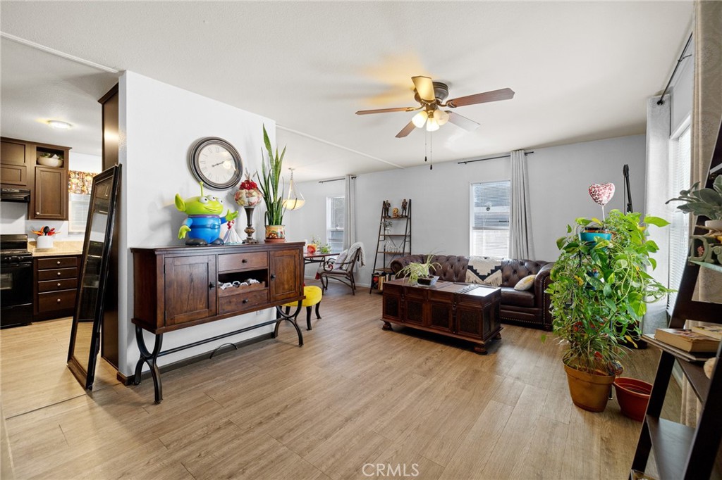 3524 East Avenue R, Unit 121 Palmdale, CA 93550 - Photo 2 of 40 a living room with furniture and a window
