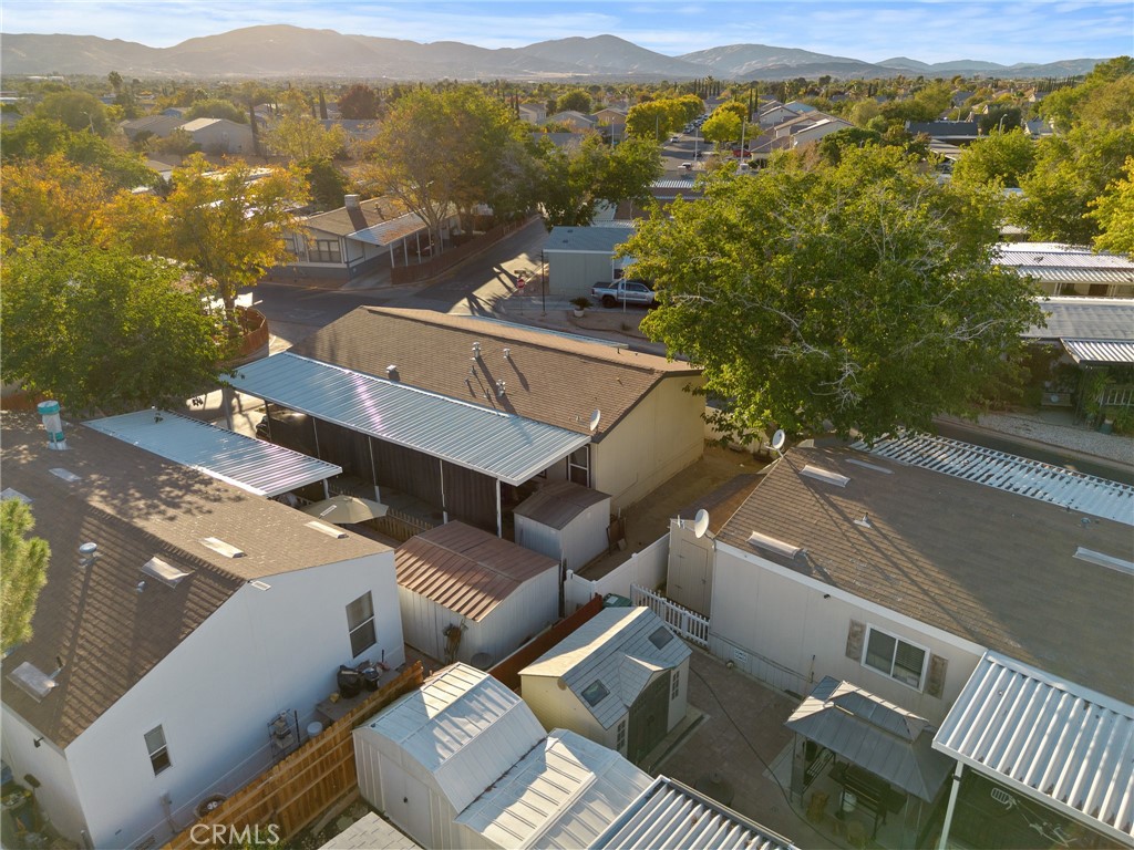 3524 East Avenue R, Unit 121 Palmdale, CA 93550 - Photo 39 of 40 an aerial view of a house with a mountain
