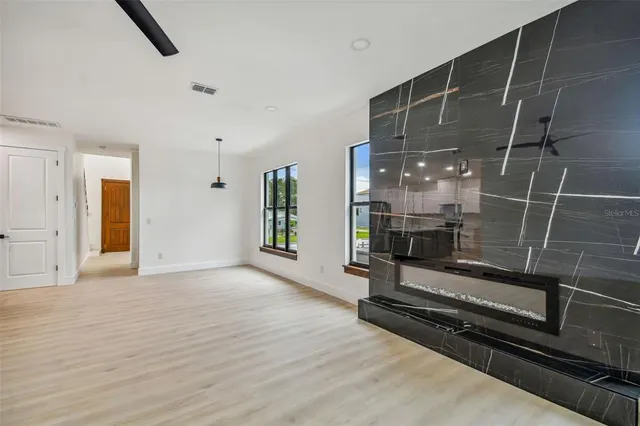 a kitchen with a sink stove and refrigerator