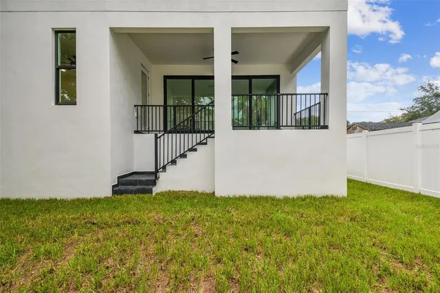 a view of a two chairs in the porch