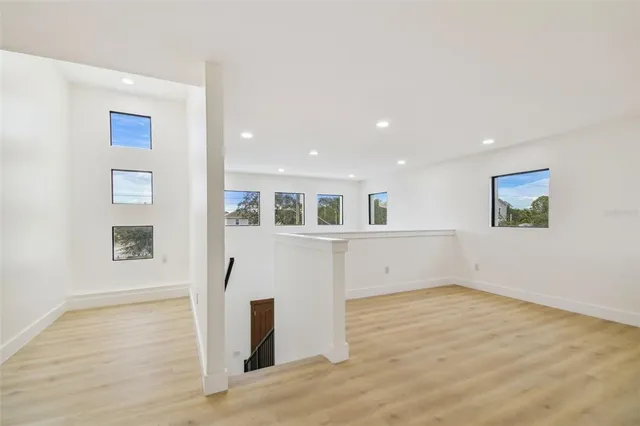 a bathroom with a sink and vanity
