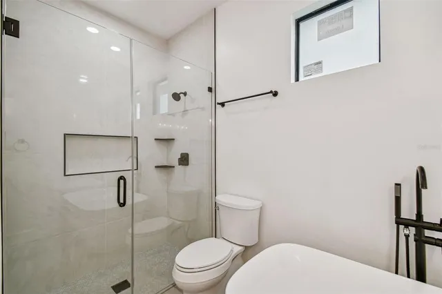 a view of a sink and a window