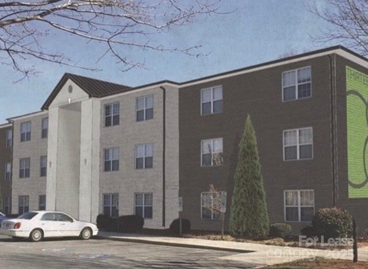 1310 Fleming Road, Unit P Greensboro, NC 27410 - Photo 11 of 12 a car parked in front of a building