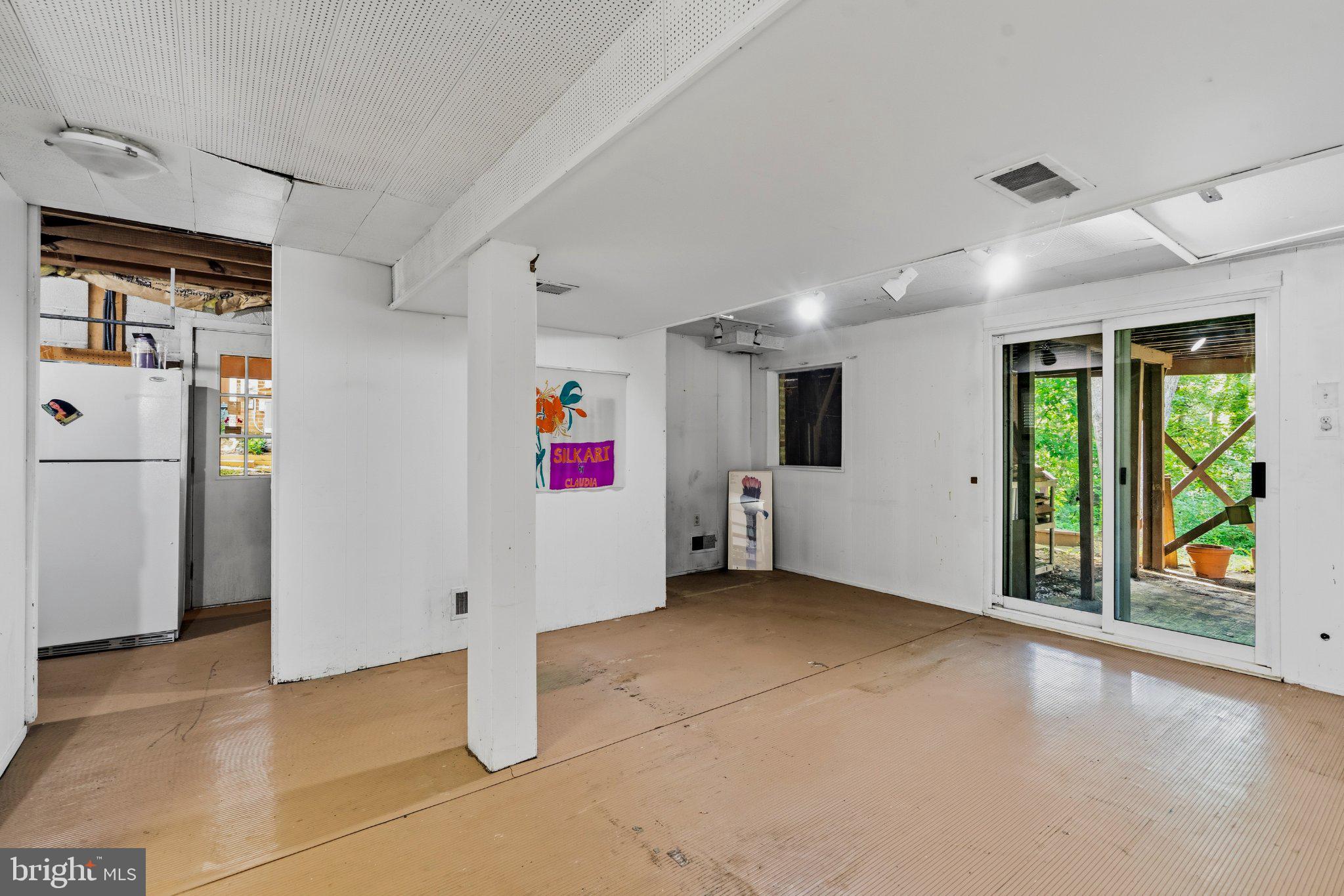 6408 West Halbert Road Bethesda, MD 20817 - Photo 21 of 33 Lower level 2 with exit to the back yard.