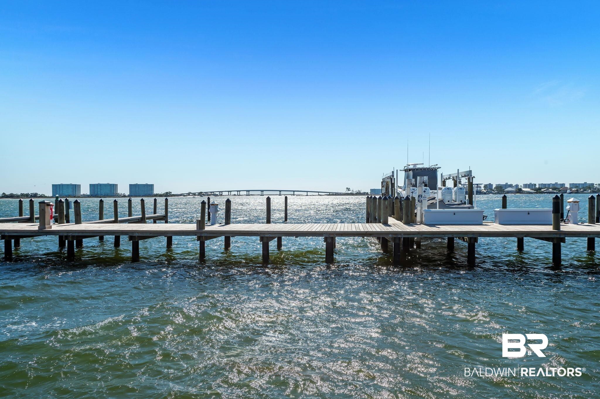 27580 Canal Road, Unit 1214 AND BOAT SLIP #62 Orange Beach, AL 36561 - Photo 65 of 67 Dock area with a water view