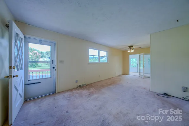 an empty room with windows