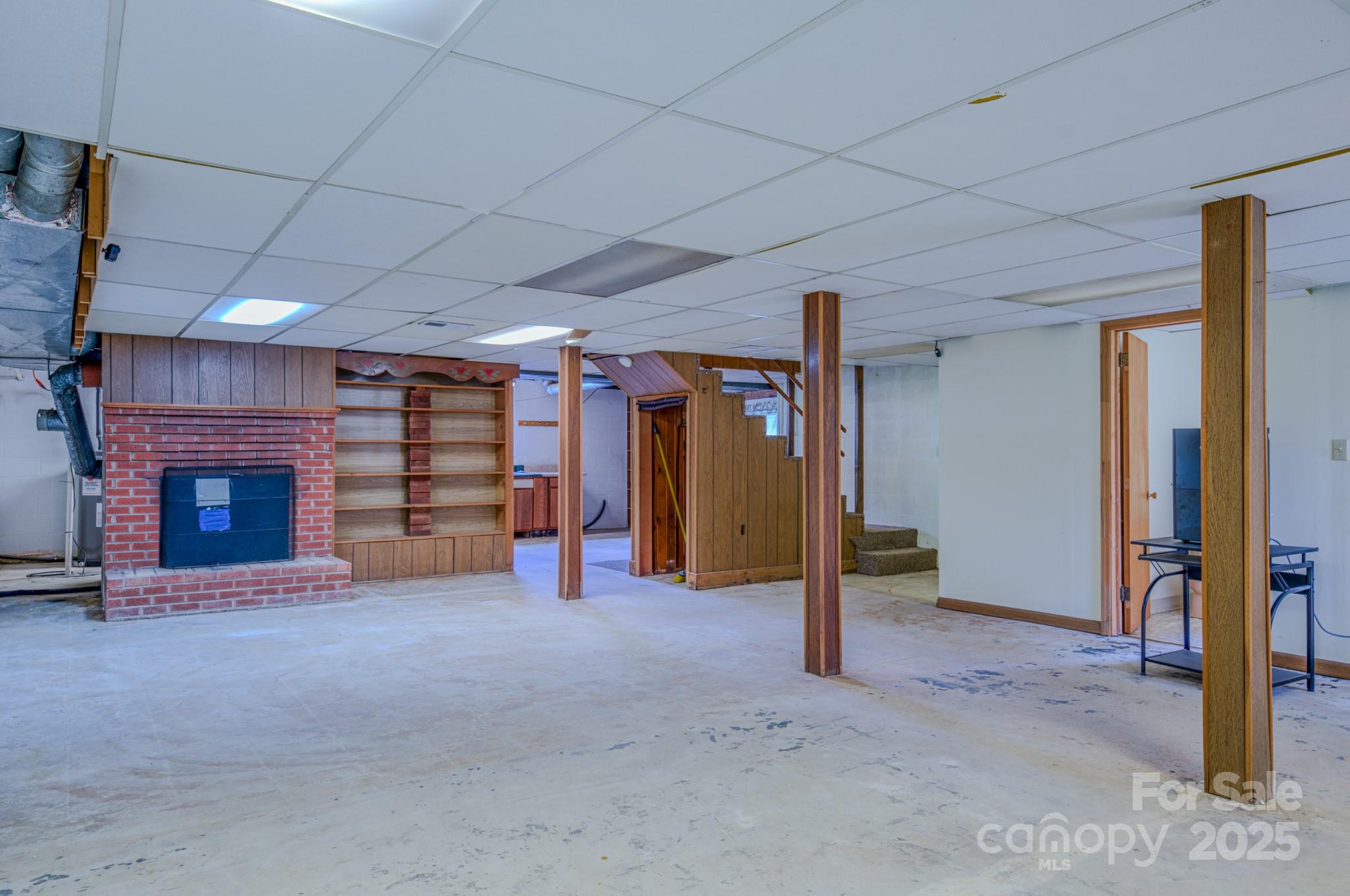 26 Big Cove Road Candler, NC 28715 - Photo 32 of 47 a view of a livingroom with fireplace and furniture