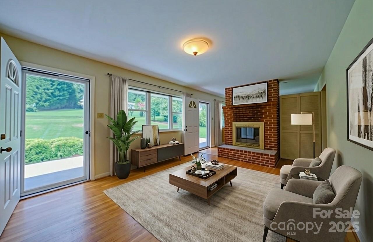 26 Big Cove Road Candler, NC 28715 - Photo 6 of 47 a living room with furniture and a large window