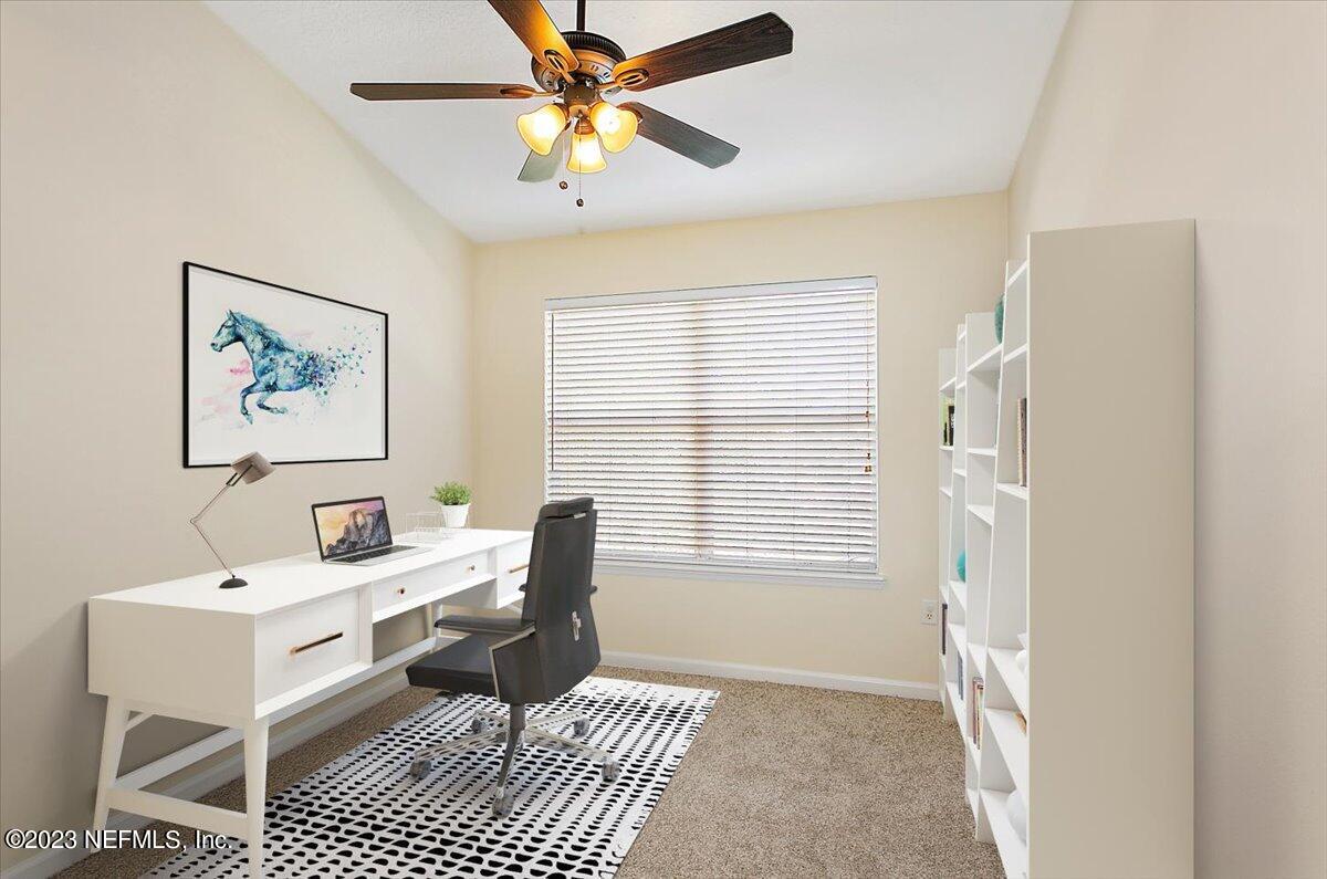 628 Crystal Way Orange Park, FL 32065 - Photo 11 of 21 a living room with furniture and a window
