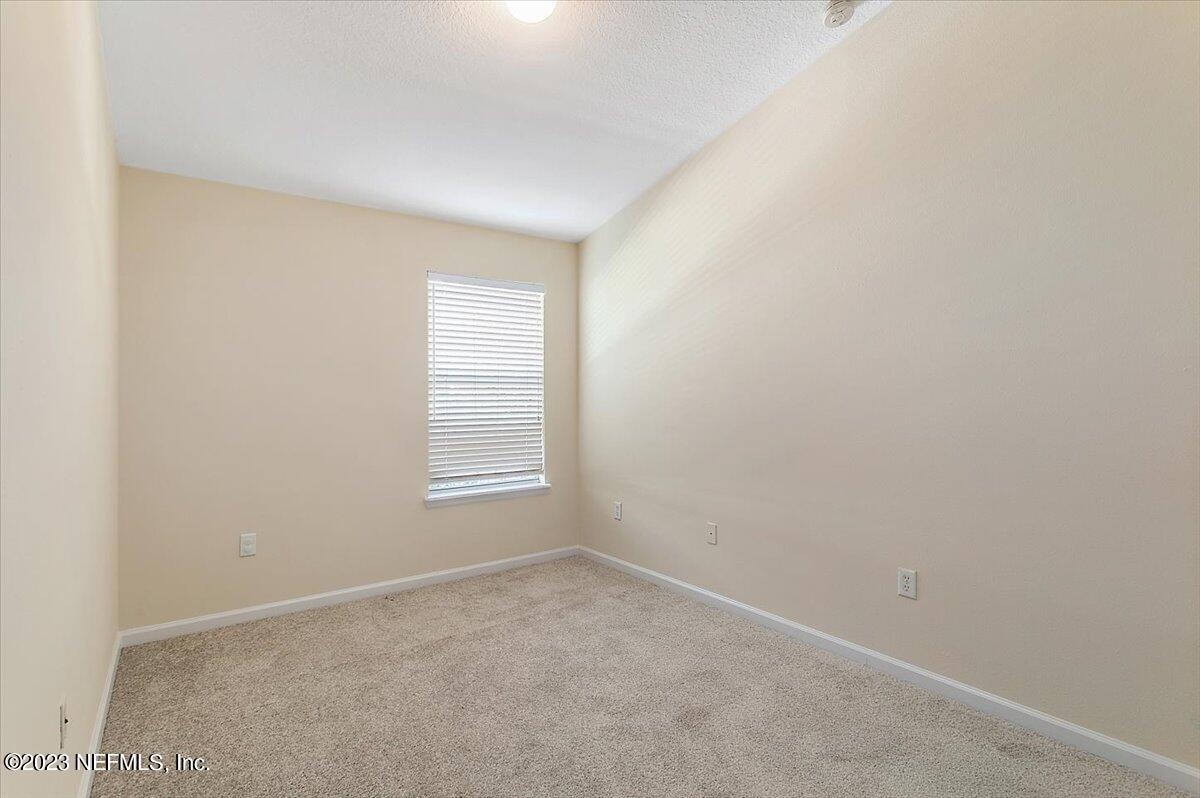 628 Crystal Way Orange Park, FL 32065 - Photo 13 of 21 an empty room with a window