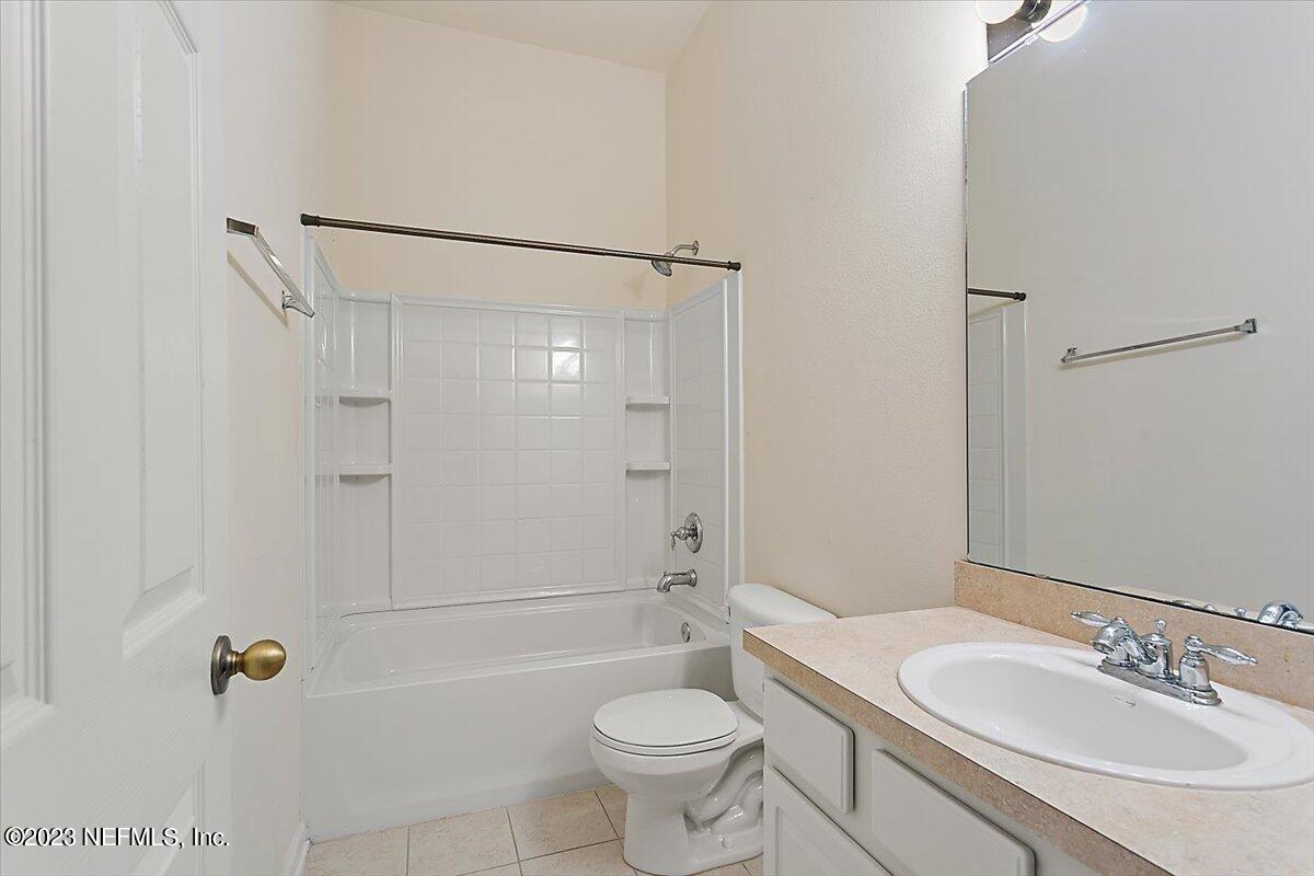 628 Crystal Way Orange Park, FL 32065 - Photo 15 of 21 a bathroom with a sink toilet and shower