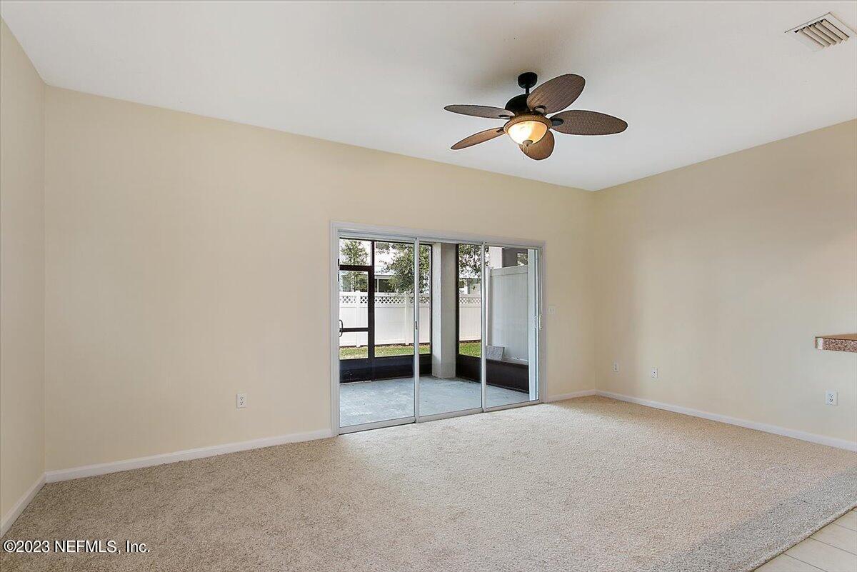 628 Crystal Way Orange Park, FL 32065 - Photo 16 of 21 a view of an empty room with a window