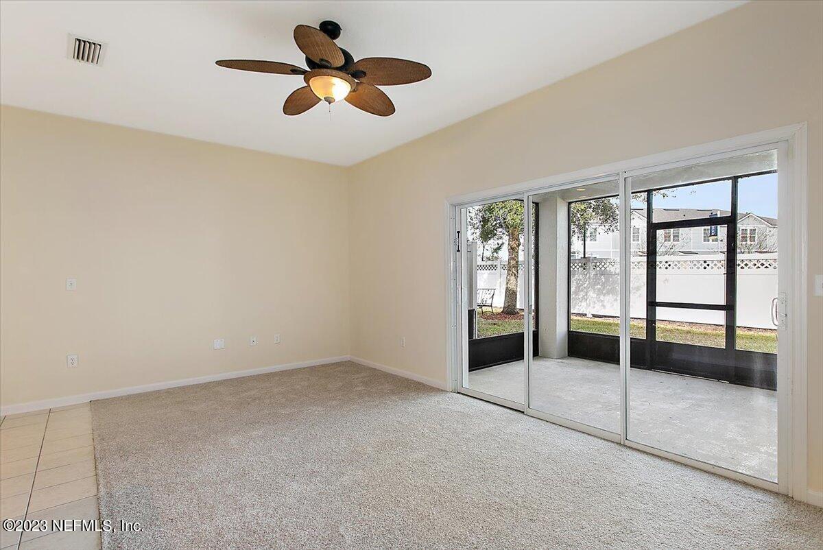 628 Crystal Way Orange Park, FL 32065 - Photo 17 of 21 a view of an empty room with a window