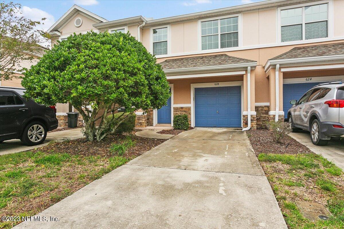 628 Crystal Way Orange Park, FL 32065 - Photo 2 of 21 a view of a car parked in front of a house