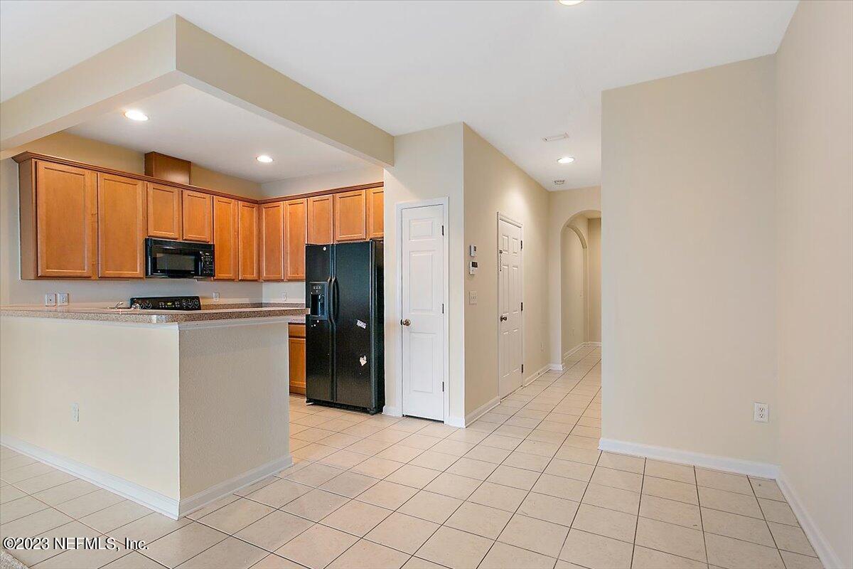 628 Crystal Way Orange Park, FL 32065 - Photo 6 of 21 a view of kitchen with refrigerator cabinets and furniture