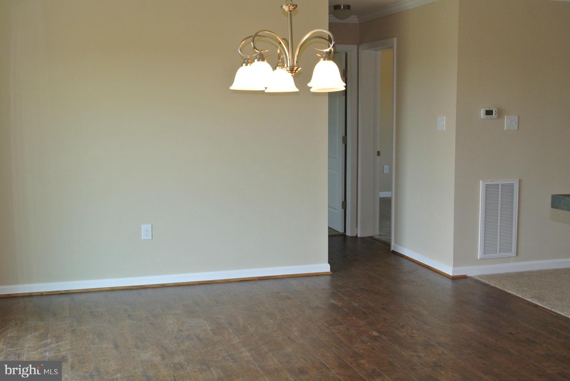 19374 Batna Road Culpeper, VA 22701 - Photo 4 of 22 Dining Room w/ new hickory lam. wood flooring