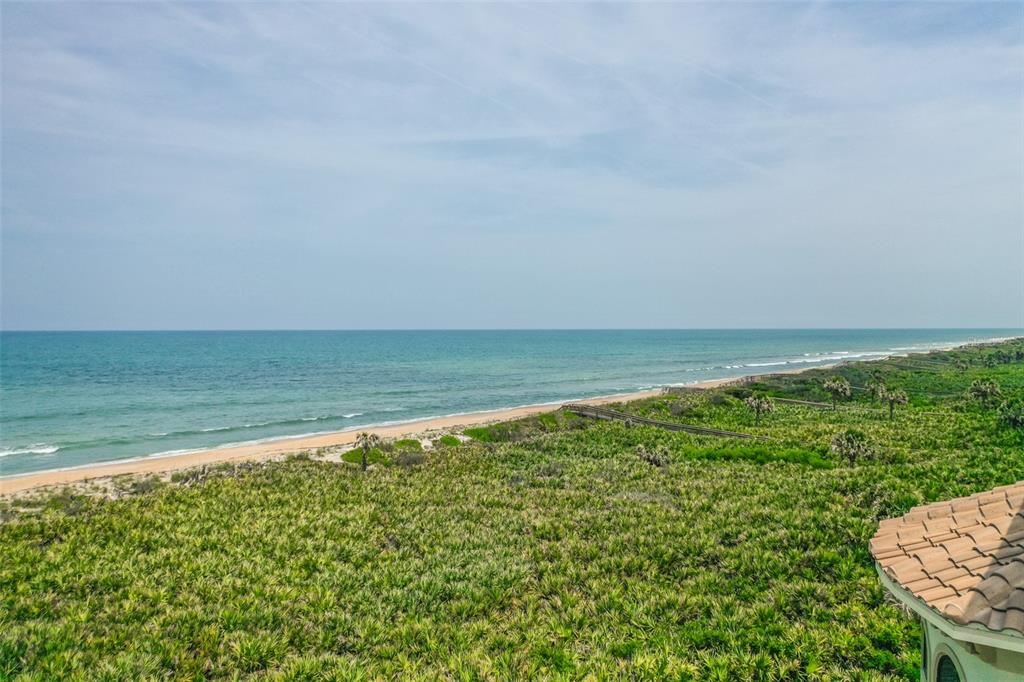 52 Ocean Ridge Boulevard Palm Coast, FL 32137 - Photo 13 of 36 a view of an ocean from a balcony