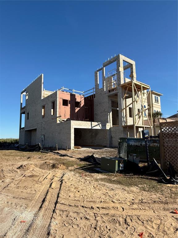52 Ocean Ridge Boulevard Palm Coast, FL 32137 - Photo 3 of 36 a front view of a house with a yard