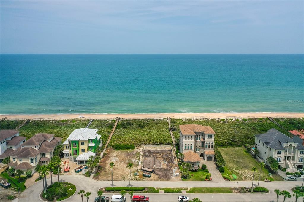 52 Ocean Ridge Boulevard Palm Coast, FL 32137 - Photo 5 of 36 an aerial view of a house with a garden