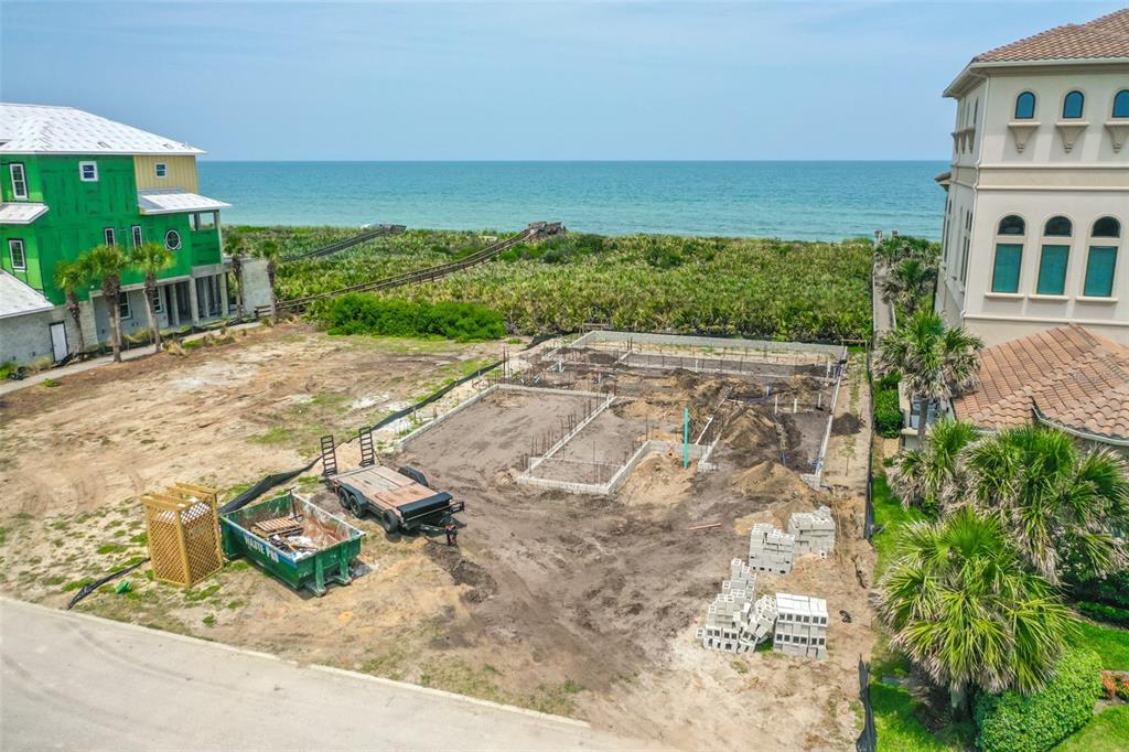 52 Ocean Ridge Boulevard Palm Coast, FL 32137 - Photo 6 of 36 a view of a terrace with yard