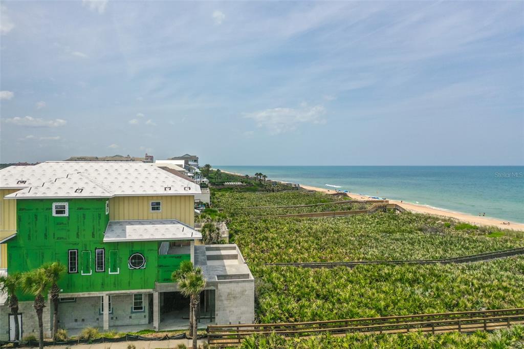 52 Ocean Ridge Boulevard Palm Coast, FL 32137 - Photo 8 of 36 a aerial view of a house with a yard