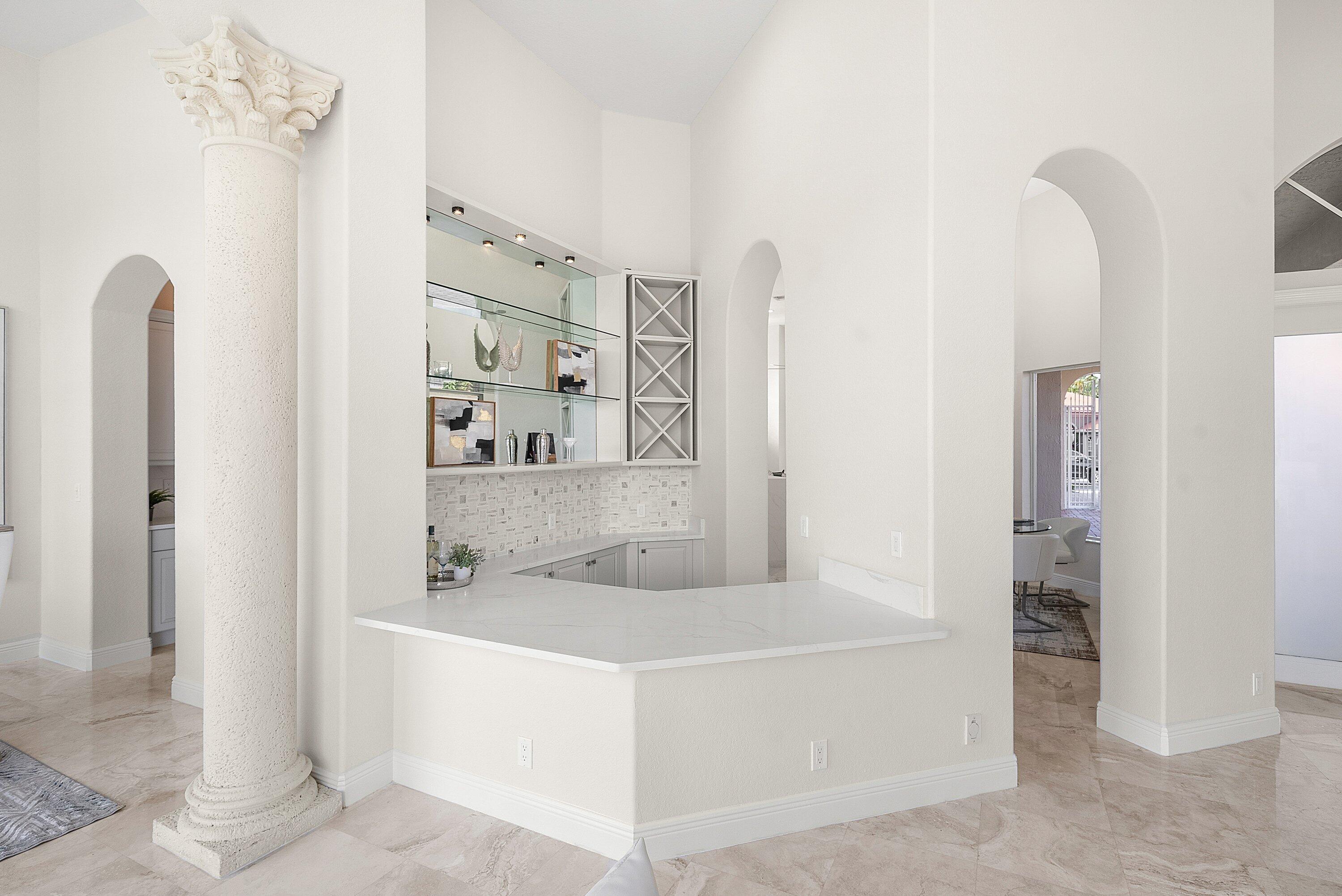 6468 Polo Pointe Way Delray Beach, FL 33484 - Photo 7 of 89 a bathroom with a bathtub sink and mirror