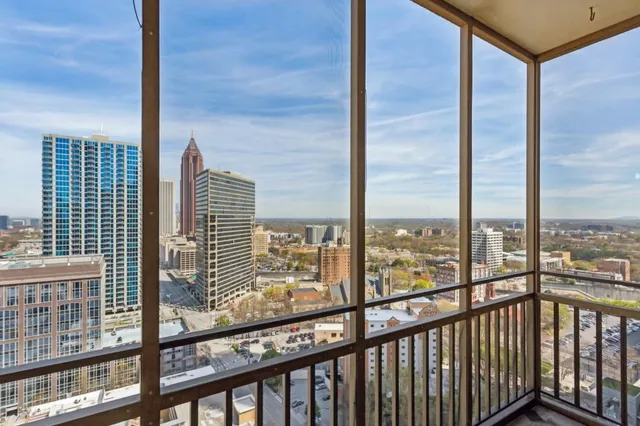 a view of a balcony with city view