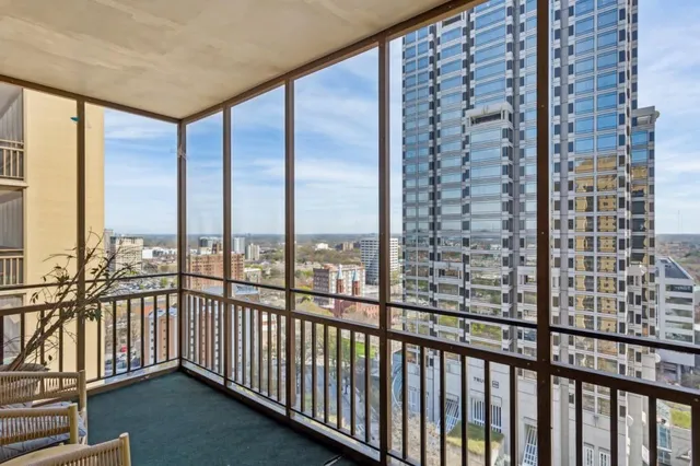 a view of a balcony with city view