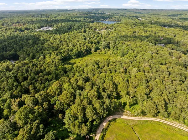 a view of a yard with an outdoor space and seating