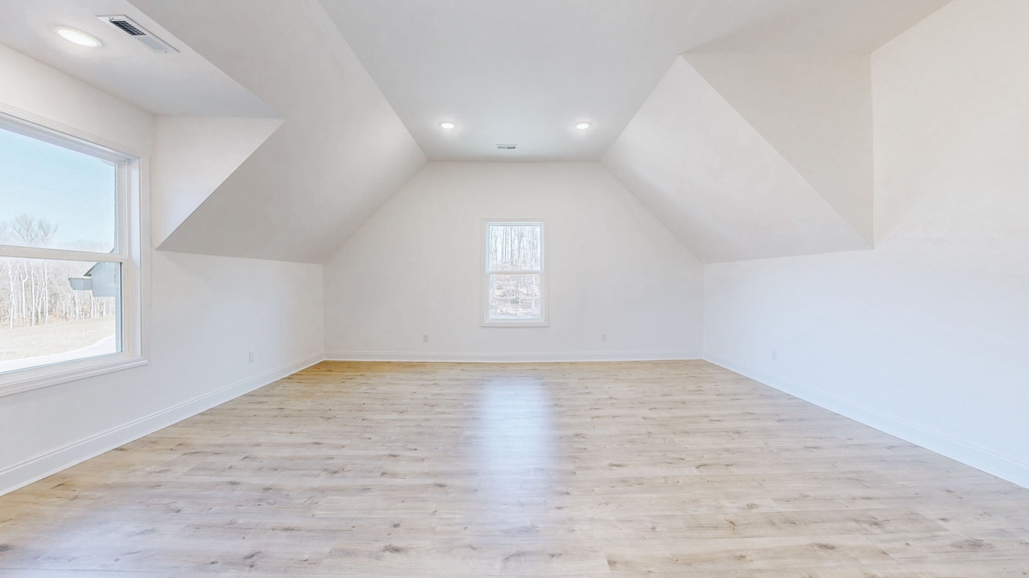1208 Rooster Rdg Road Joelton, TN 37080 - Photo 18 of 25 an empty room with wooden floor and windows