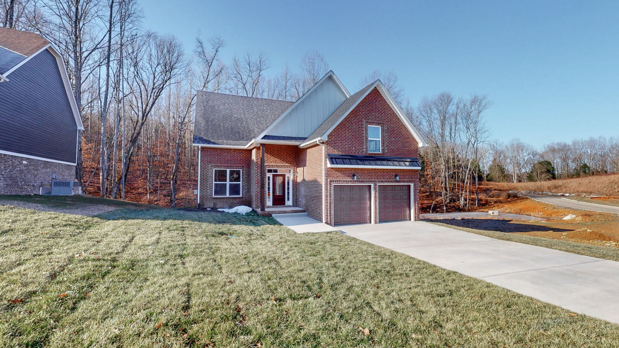 1208 Rooster Rdg Road Joelton, TN 37080 - Photo 23 of 25 a front view of a house with a yard and garage