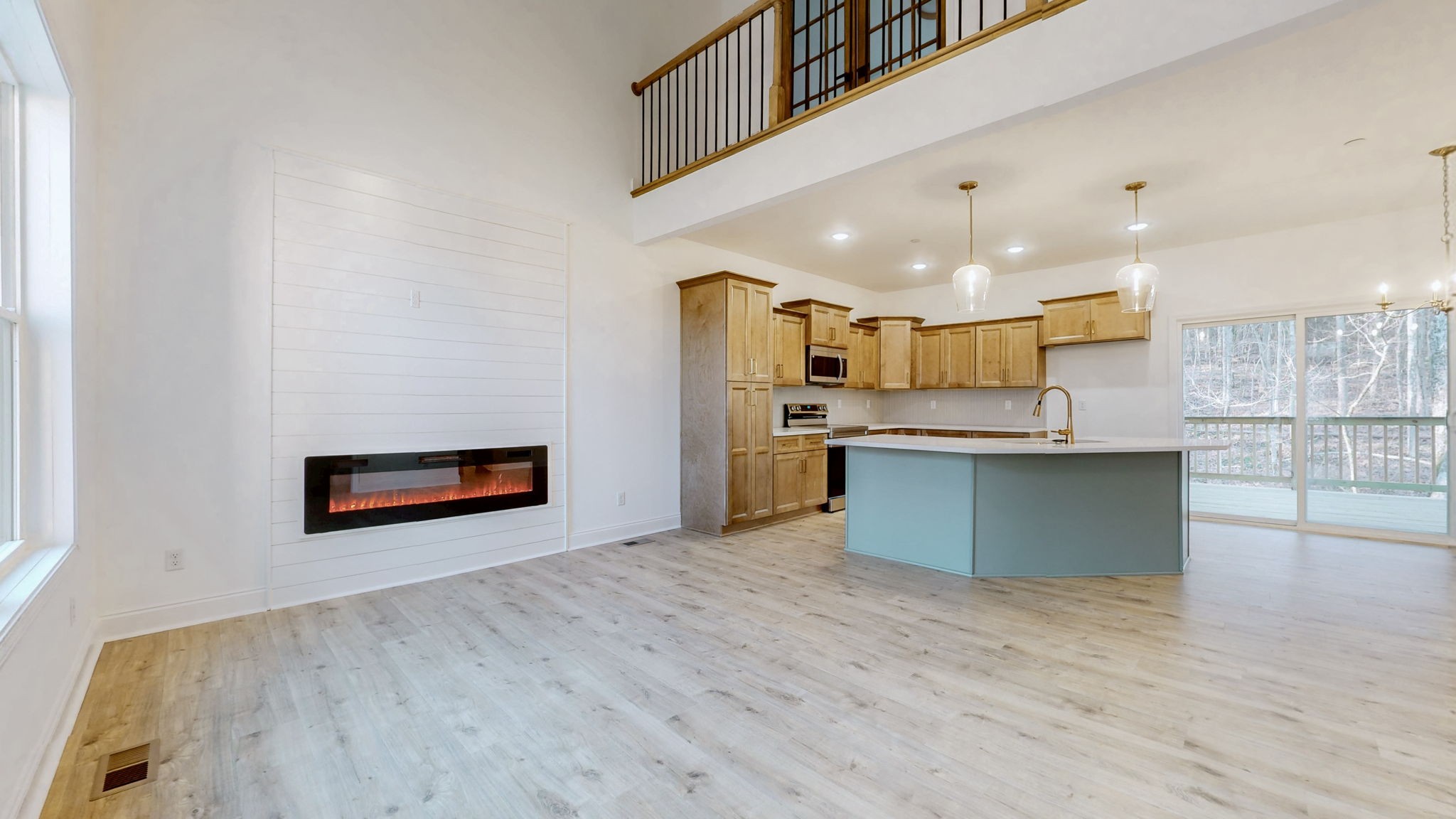 1208 Rooster Rdg Road Joelton, TN 37080 - Photo 6 of 25 a kitchen with stainless steel appliances granite countertop a refrigerator a stove and a wooden floors