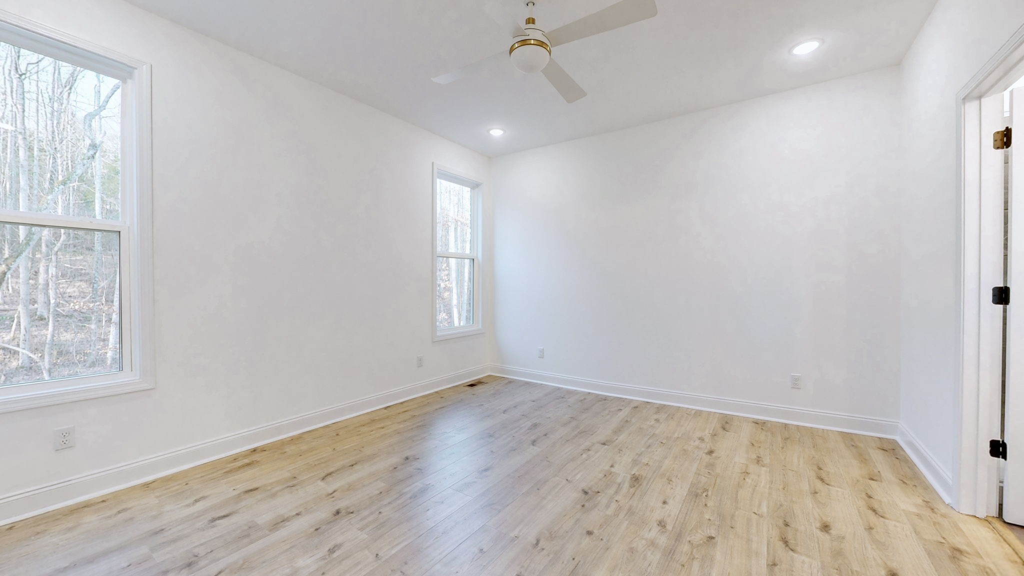 1208 Rooster Rdg Road Joelton, TN 37080 - Photo 8 of 25 an empty room with wooden floor and windows