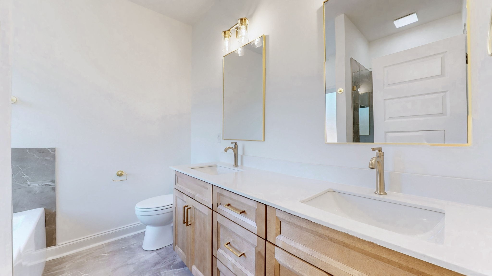 1208 Rooster Rdg Road Joelton, TN 37080 - Photo 10 of 25 a bathroom with a sink a toilet and a large mirror
