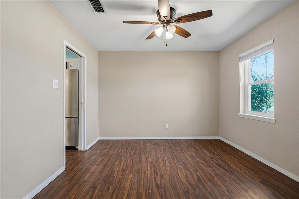 1729 Elliot Drive Canton, TX 75103 - Photo 12 of 40 Dining room with dark wood-style flooring and ceiling fan