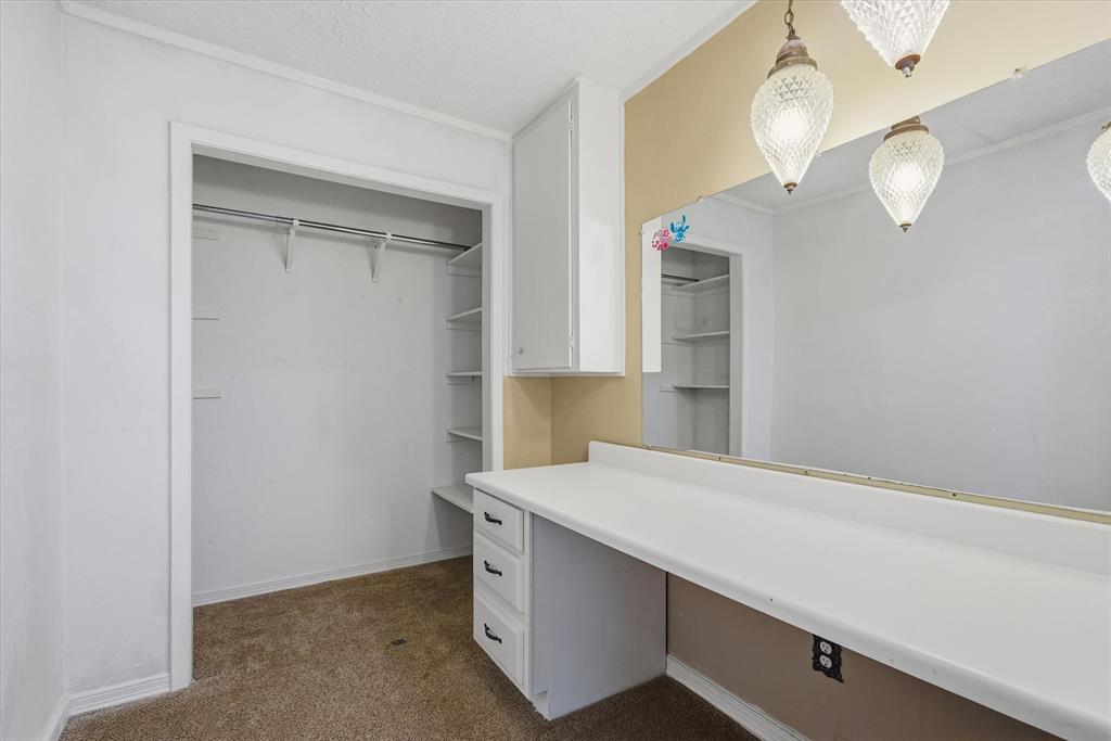 1729 Elliot Drive Canton, TX 75103 - Photo 21 of 40 Vanity Area with Closet attached to Bathroom
