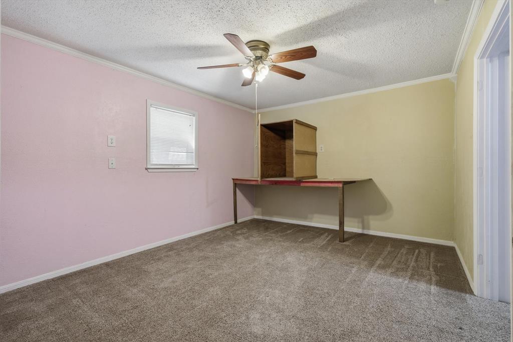 1729 Elliot Drive Canton, TX 75103 - Photo 22 of 40 Spare room with carpet, a textured ceiling, and a ceiling fan