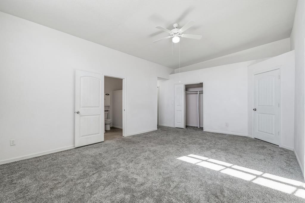 1729 Elliot Drive Canton, TX 75103 - Photo 31 of 40 bedroom with carpet floors, a ceiling fan, and a closet