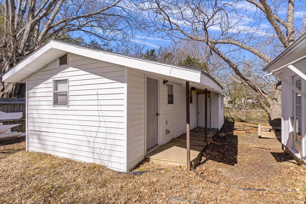 1729 Elliot Drive Canton, TX 75103 - Photo 34 of 40 View of side of property featuring an outbuilding