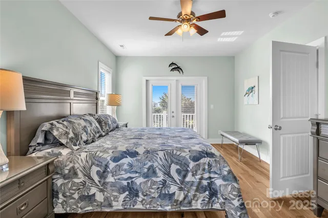 a bathroom with a granite countertop toilet sink and mirror