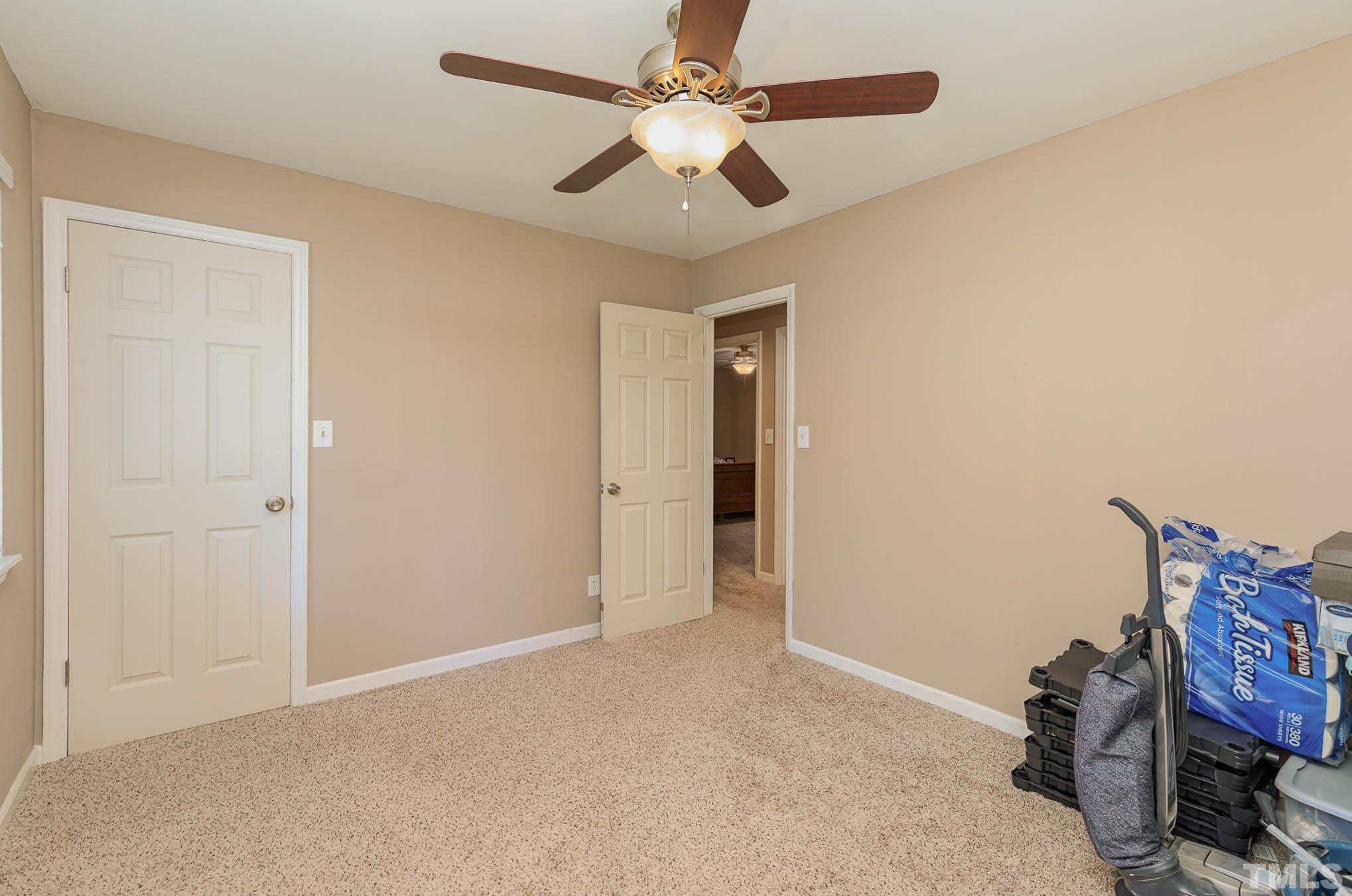 5609 Roslyn Road Durham, NC 27712 - Photo 21 of 31 a view of a livingroom with a workspace
