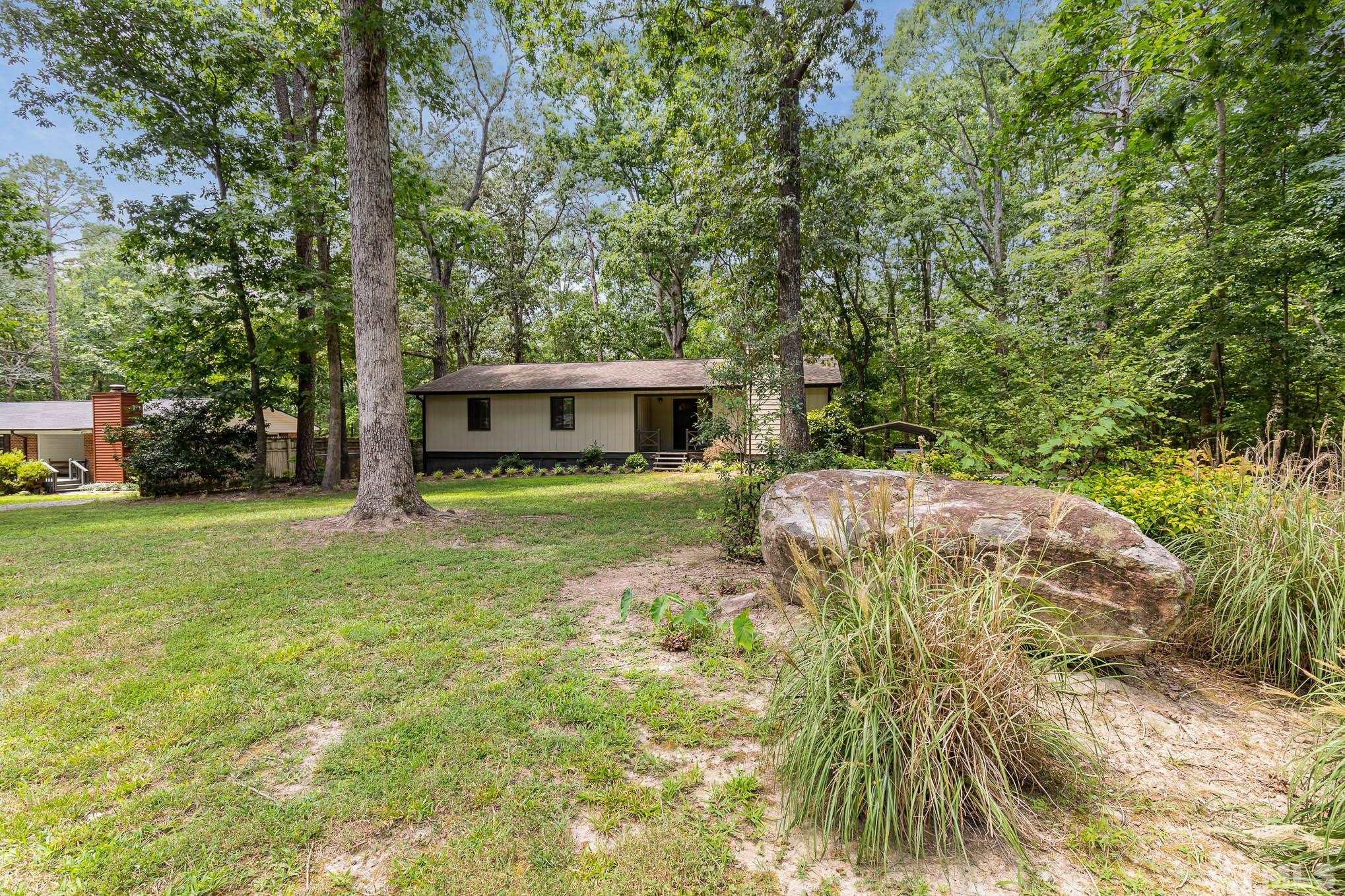 5609 Roslyn Road Durham, NC 27712 - Photo 4 of 31 a view of a house with a yard