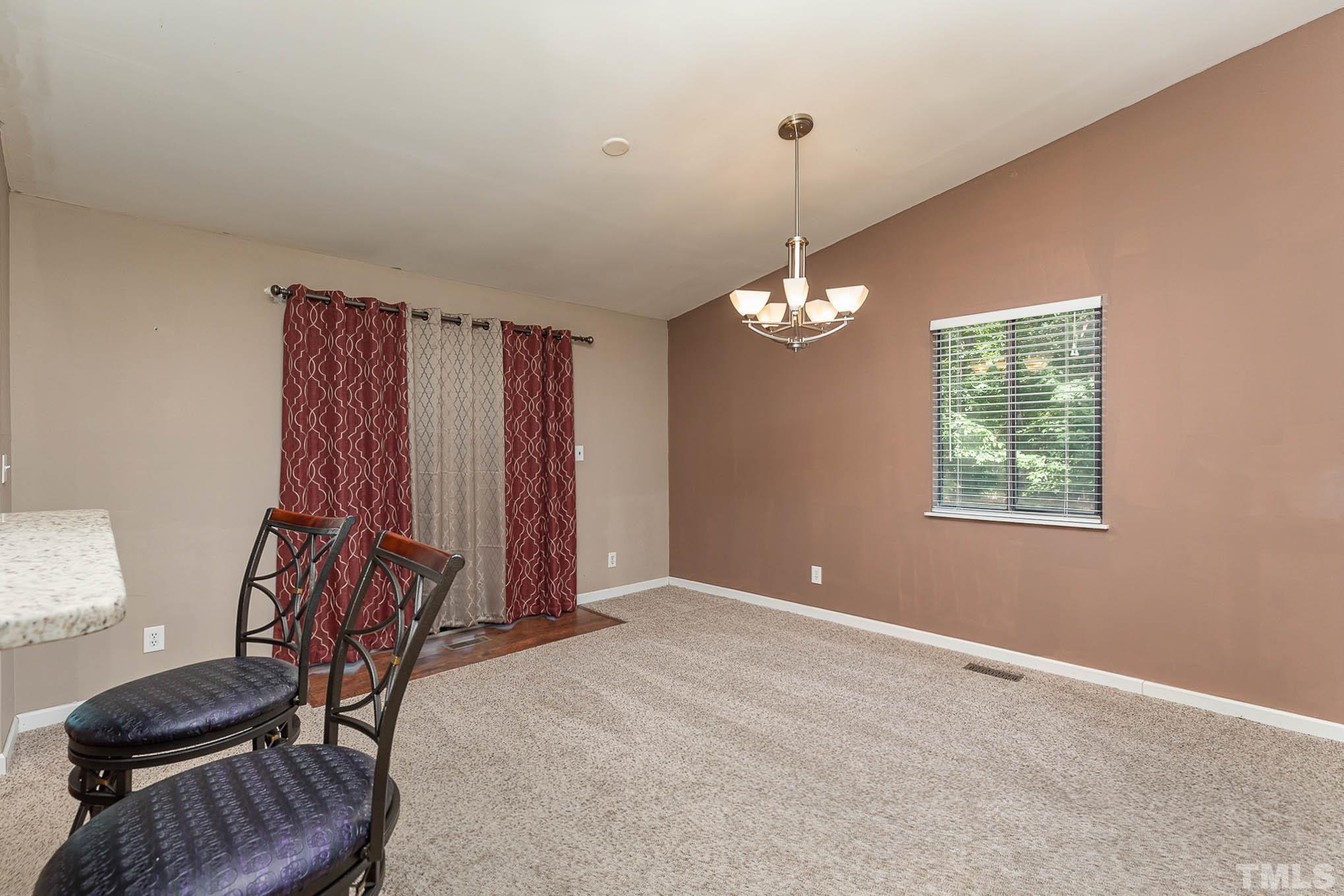5609 Roslyn Road Durham, NC 27712 - Photo 9 of 31 a view of a livingroom with furniture