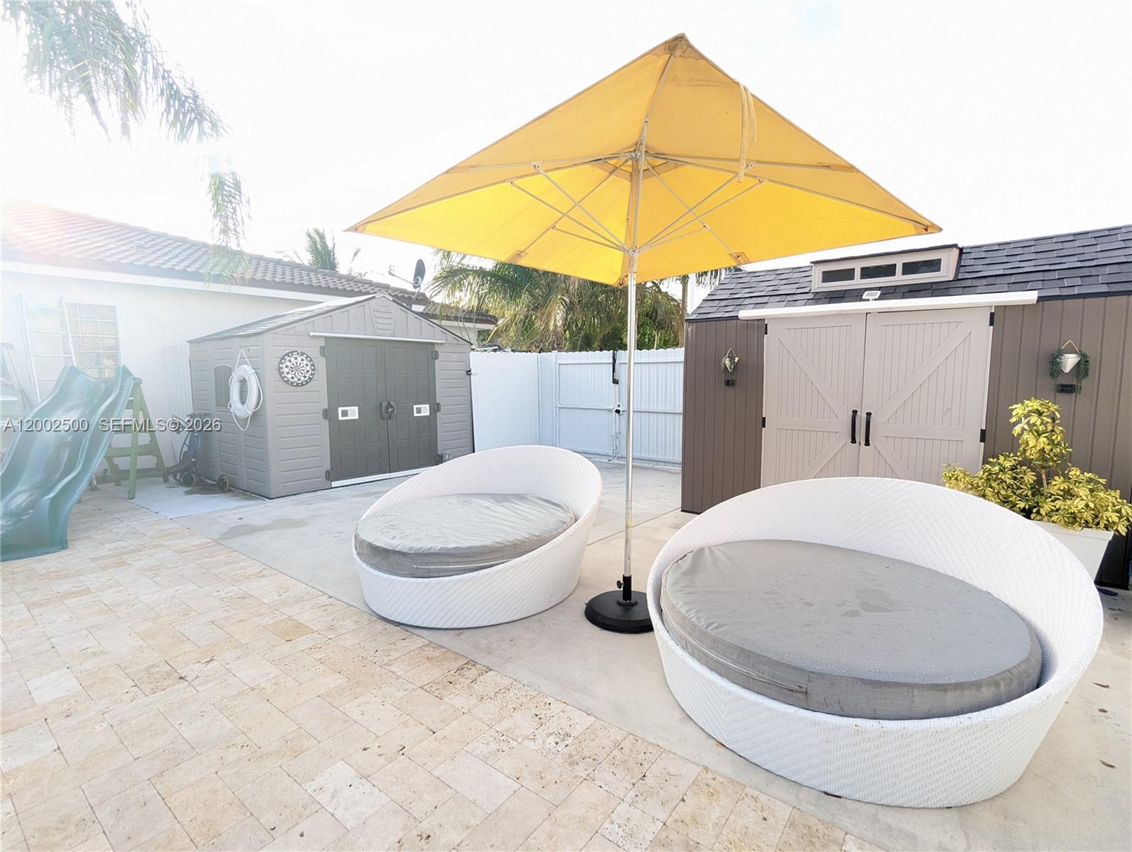 12328 Southwest 251st Terrace Homestead, FL 33032 - Photo 14 of 22 a white house with a sink and toilet