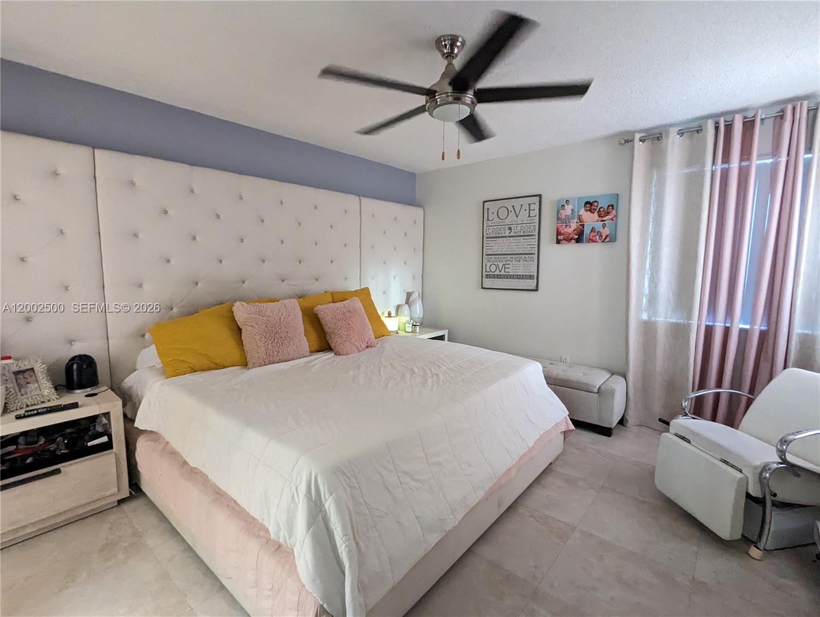 12328 Southwest 251st Terrace Homestead, FL 33032 - Photo 18 of 22 a bedroom with a bed and a couch