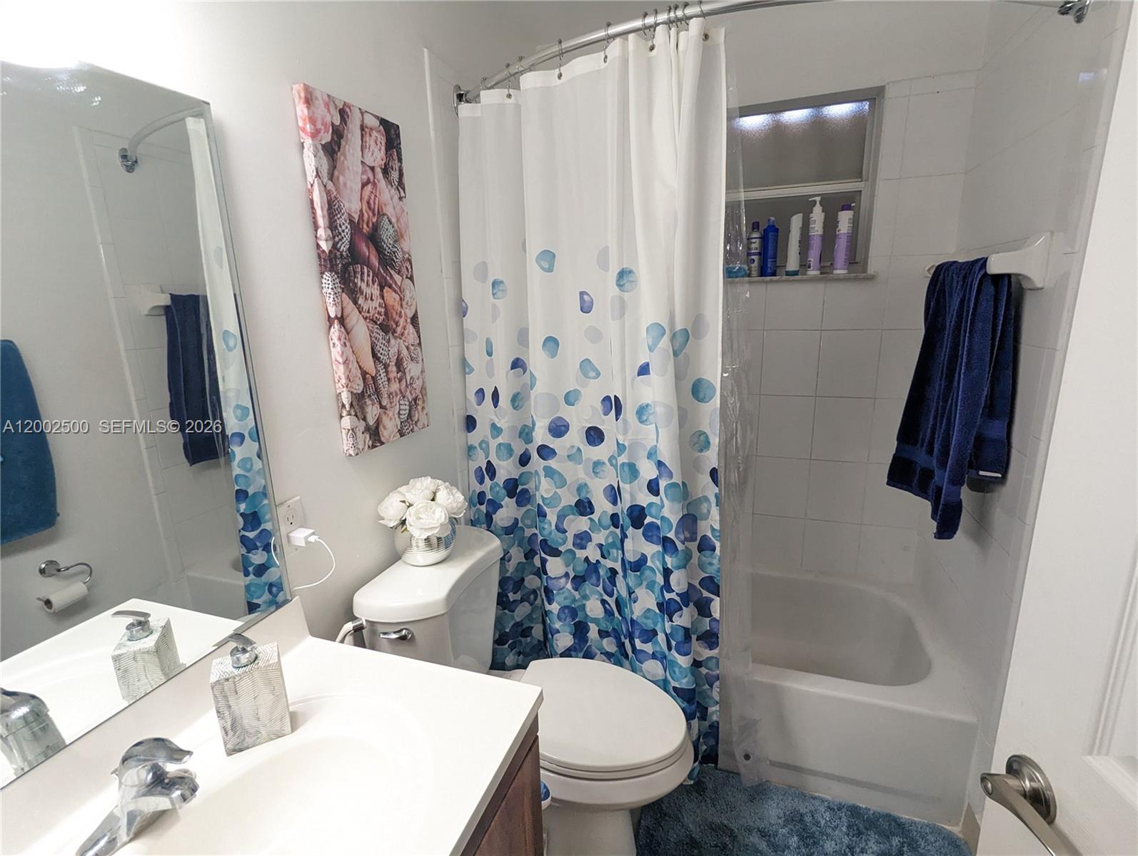 12328 Southwest 251st Terrace Homestead, FL 33032 - Photo 21 of 22 a bathroom with a sink toilet and shower